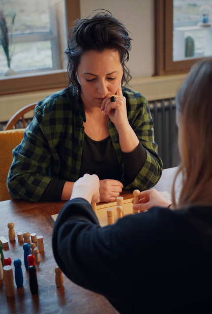Pamoya familieopstelling op tafel